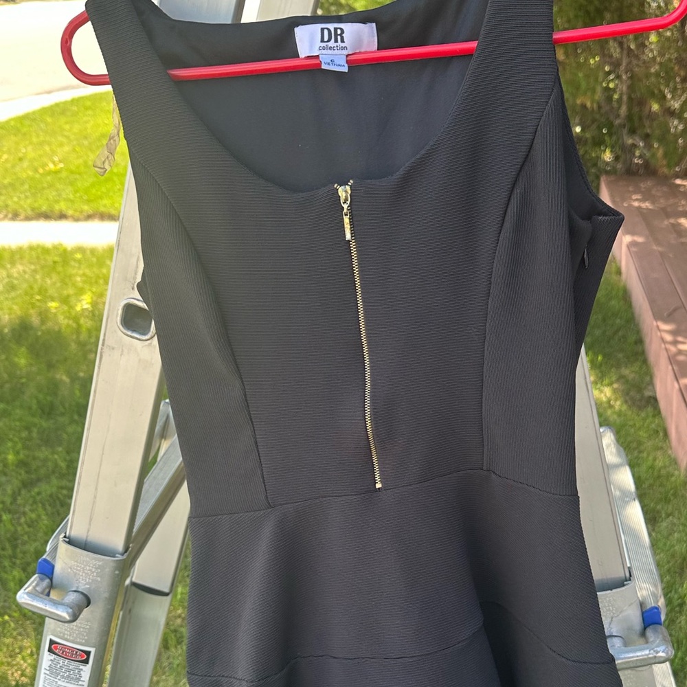 Incredibly flattering a line dress. Perfect for a wedding or event!